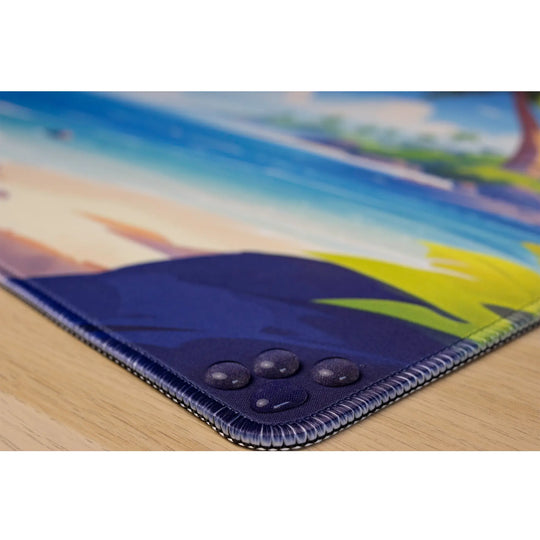 Clear water droplets on a beach themed ArcaLoot mousepad. Treasure Cove.