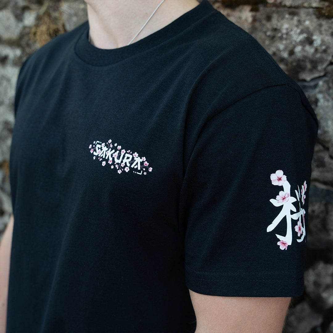 ArcaLoot Sakura black T-shirt with Japanese cherry blossom and Sakura text front logo.