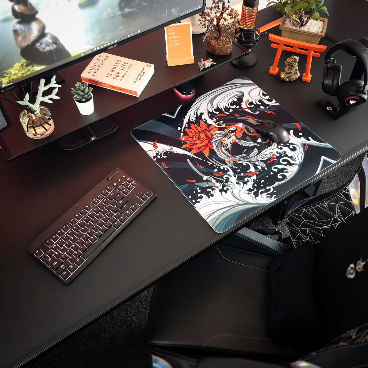 Decorative desk setup with a medium Arcaloot gaming mousepad featuring a koifish design. Rippled Tranquillity.