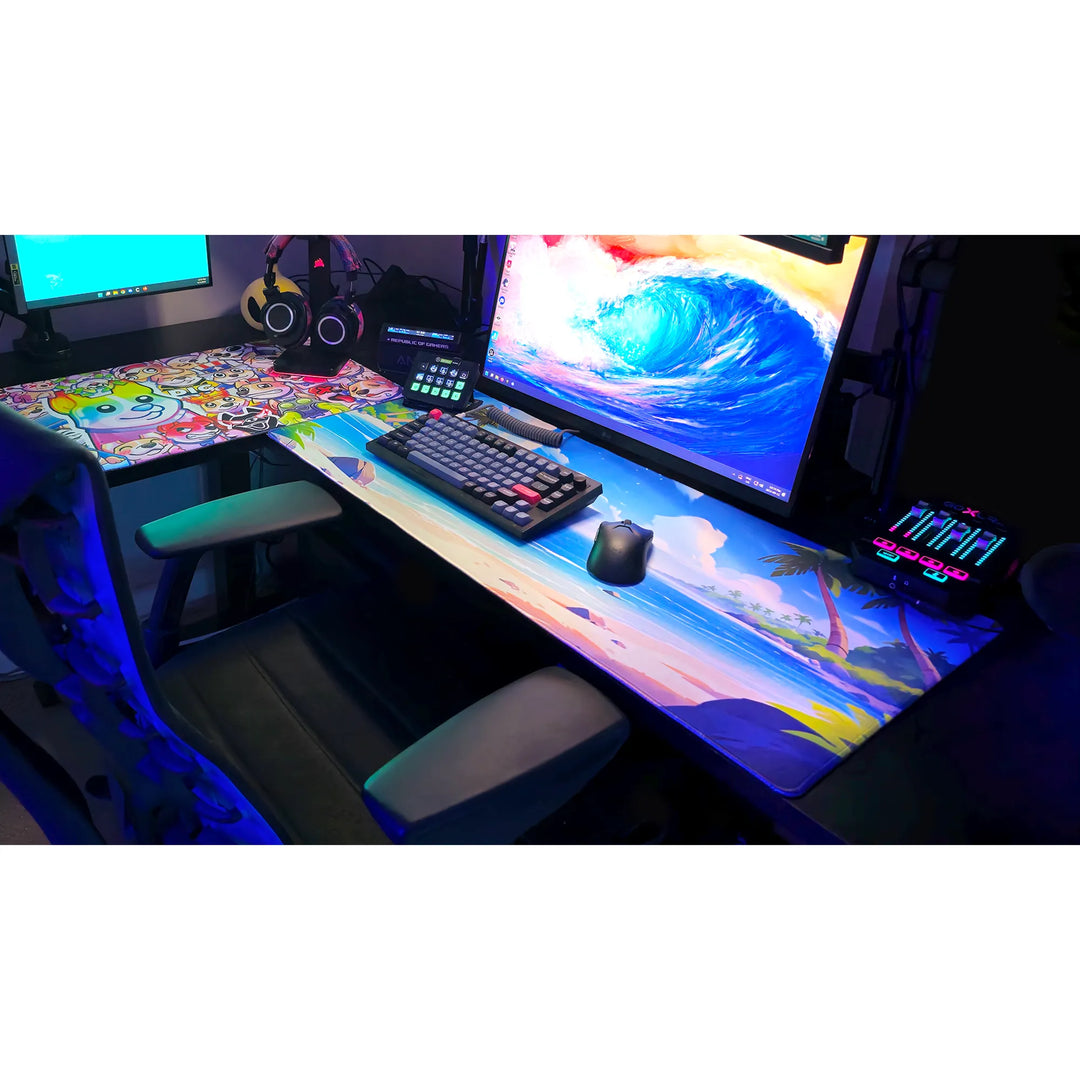 Large ArcaLoot gaming mousepad with a beach scene and palm trees on a black gaming setup. Treasure Cove.