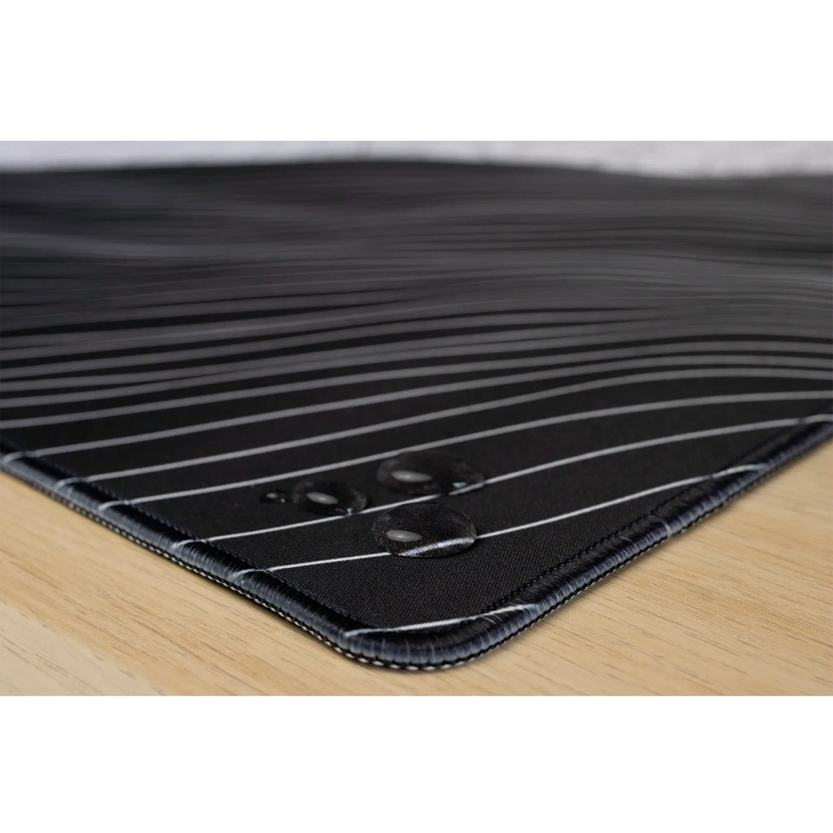 Clear water droplets on the Bare Boned Expedition ArcaLoot mousepad. Bare Boned Expedition.