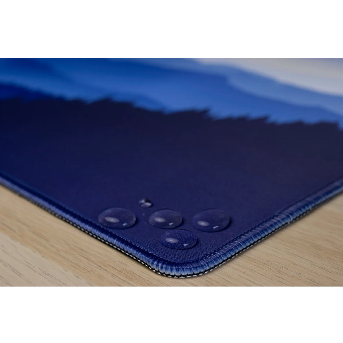 Clear water droplets on ArcaLoot Sapphire Summits design. Sapphire Summits.
