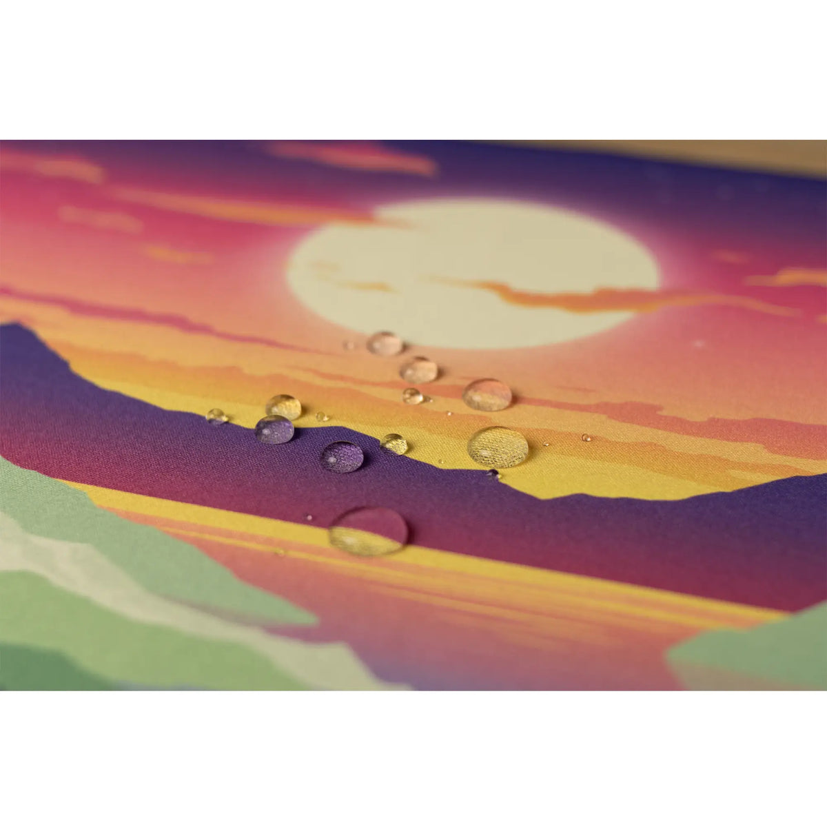 Clear water droplets on a rainbow Arcaloot gaming mousepad. Rainbow Valley. 