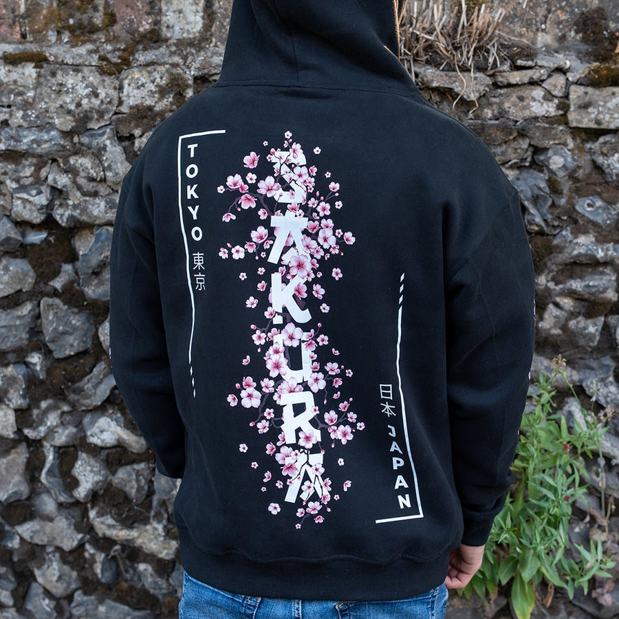 ArcaLoot Sakura black hoodie with vertical Sakura lettering and Japanese cherry blossom back design.