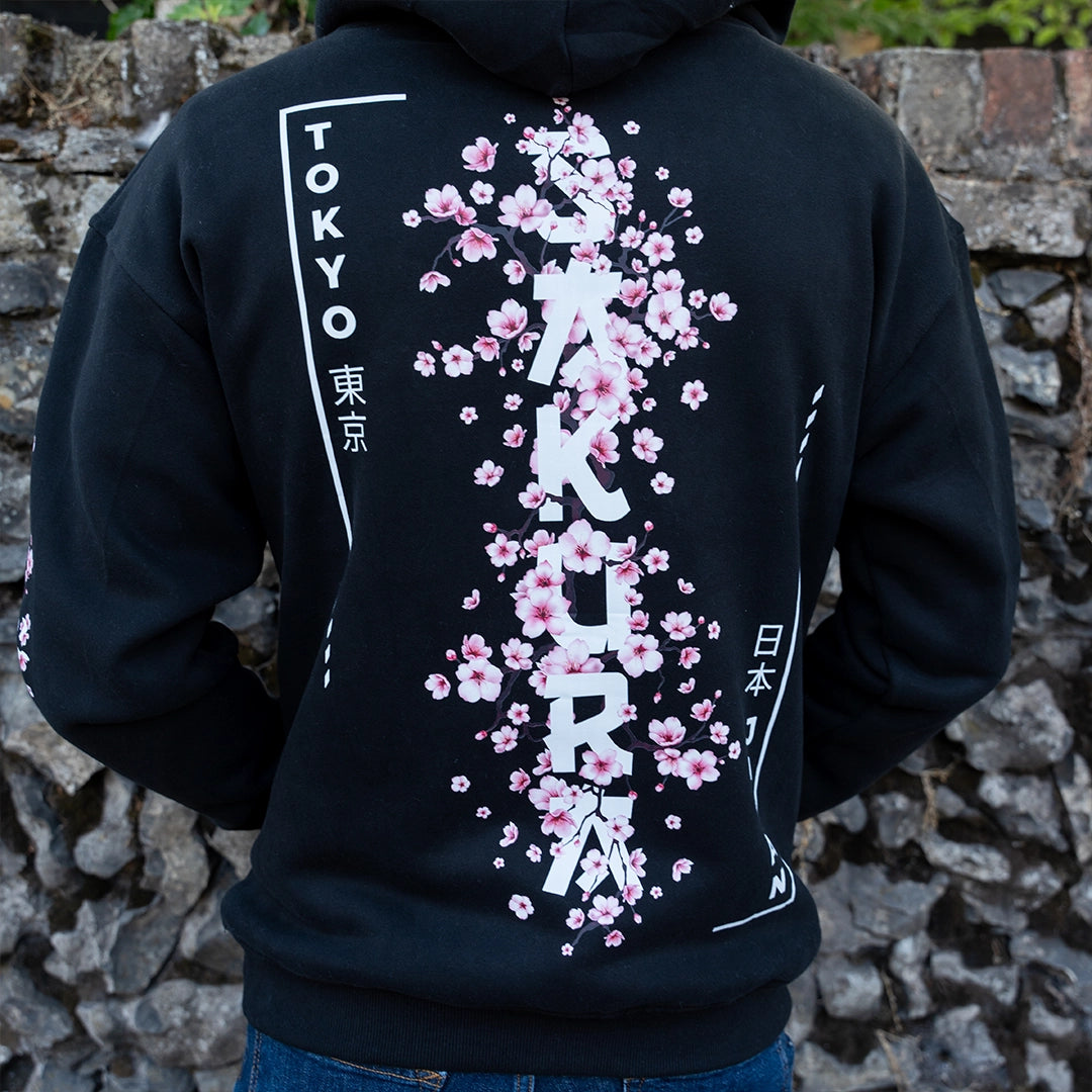 ArcaLoot Sakura black hoodie with vertical Sakura lettering and Japanese  cherry blossoms back design.