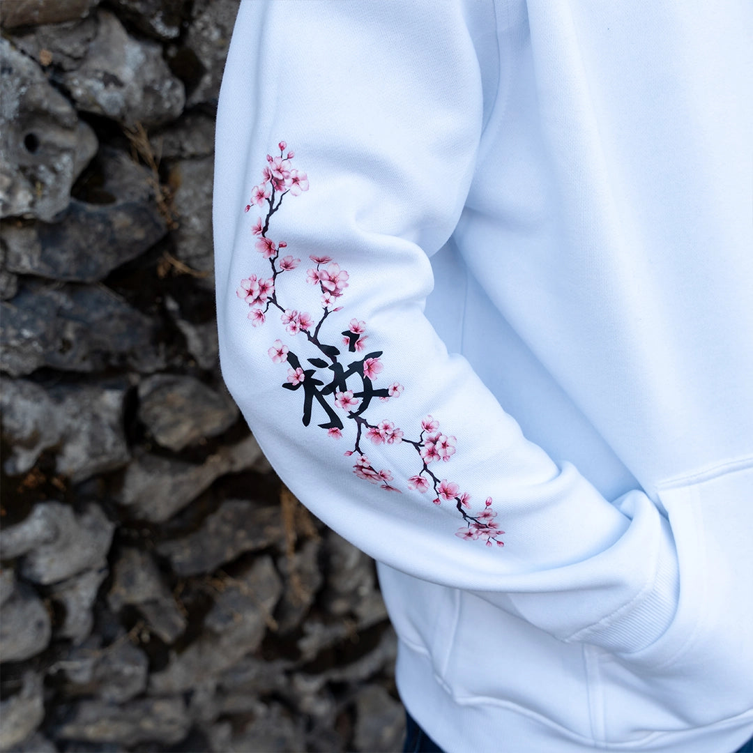 ArcaLoot Sakura white hoodie sleeve with Japanese lettering for Sakura and cherry blossoms artwork.