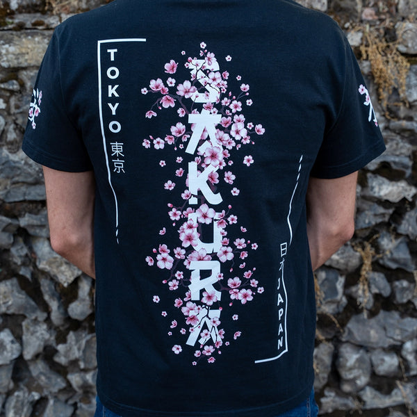 ArcaLoot Sakura black T-shirt with vertical Sakura lettering and Japanese cherry blossom back design.