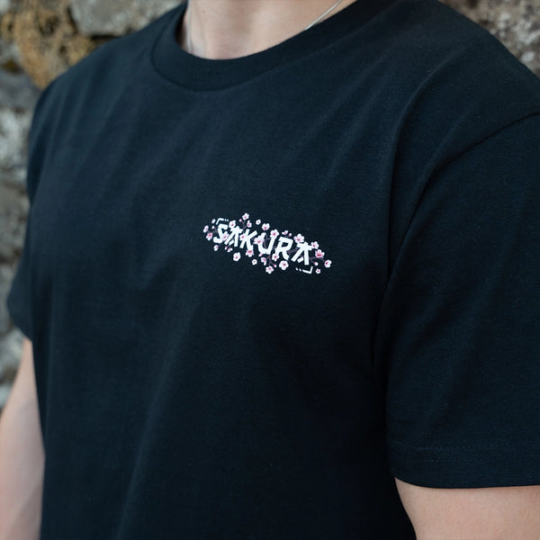 ArcaLoot Sakura black T-shirt with Japanese cherry blossom and Sakura text front logo.