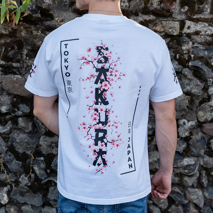 ArcaLoot Sakura white T-shirt with vertical Sakura lettering and Japanese cherry blossom back design.