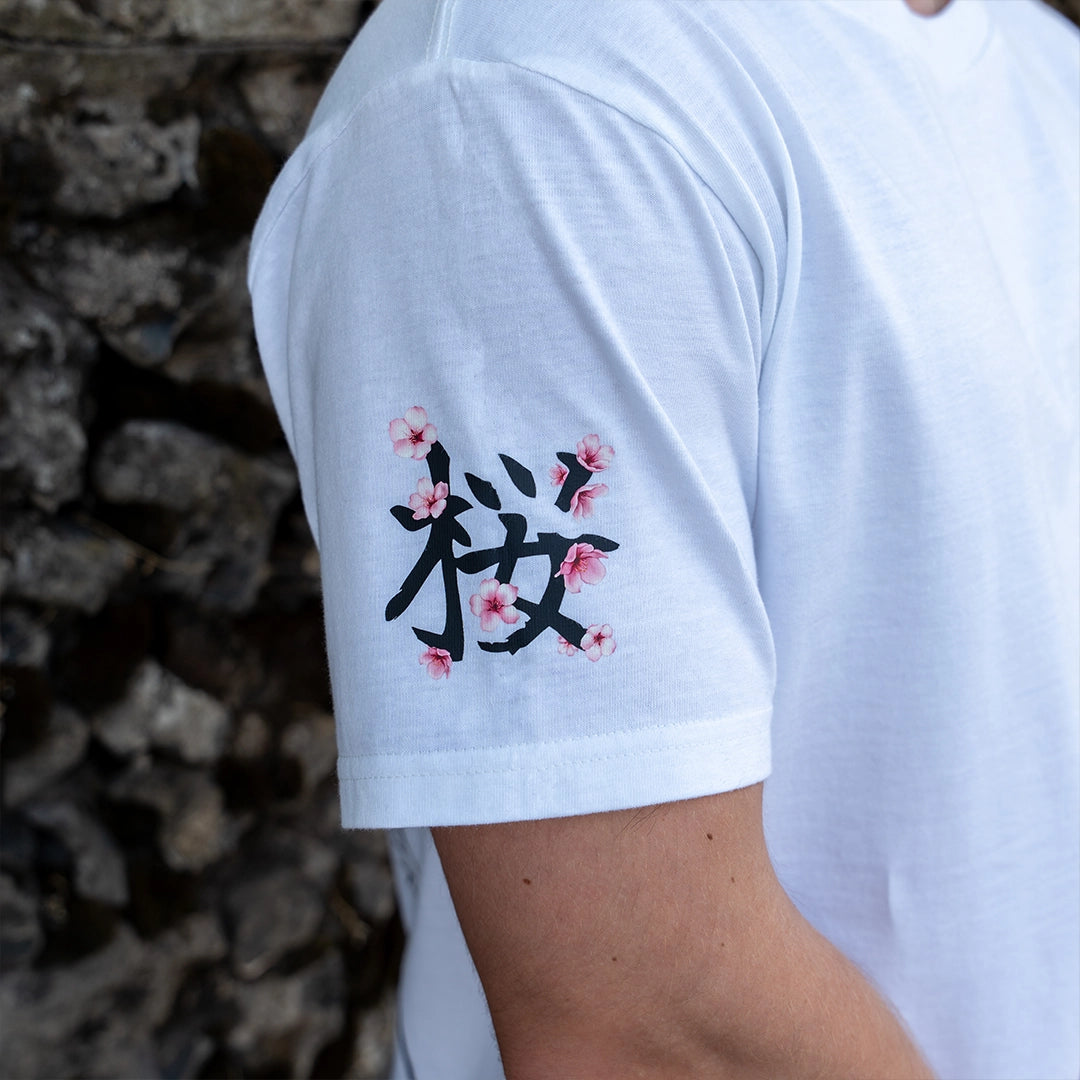 ArcaLoot Sakura white T-shirt sleeve with Japanese lettering for Sakura and cherry blossoms artwork.