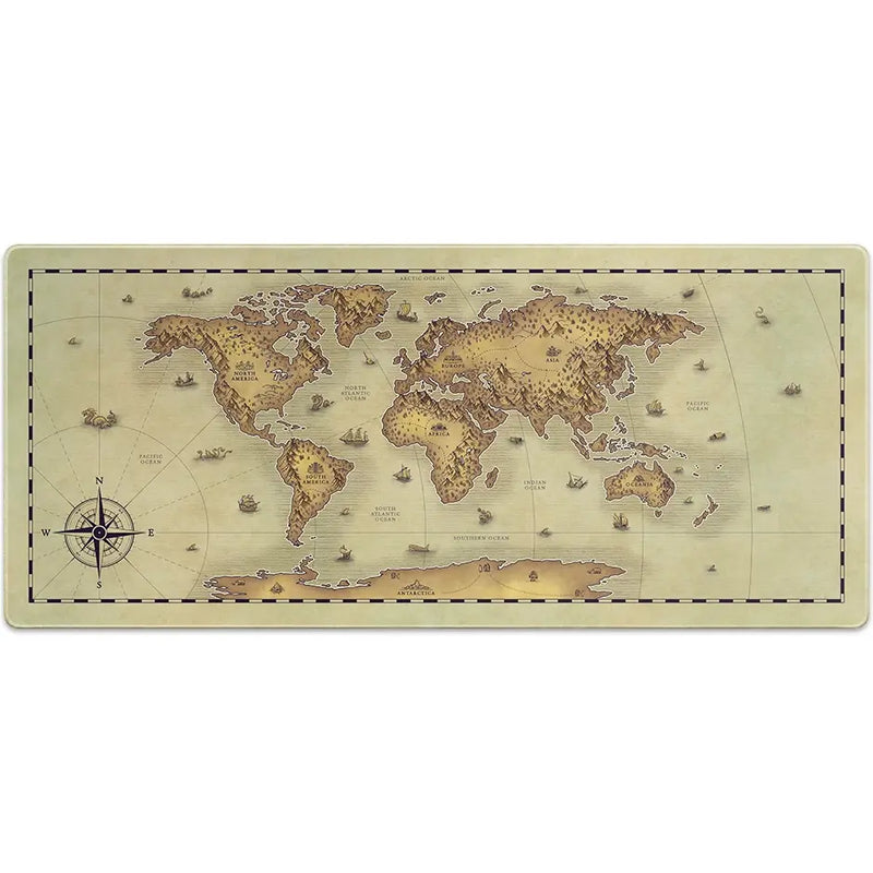 Decorative desk setup with a Extra Large Arcaloot gaming mousepad featuring a world map design. Unchartered Earth. Fantasy Map.