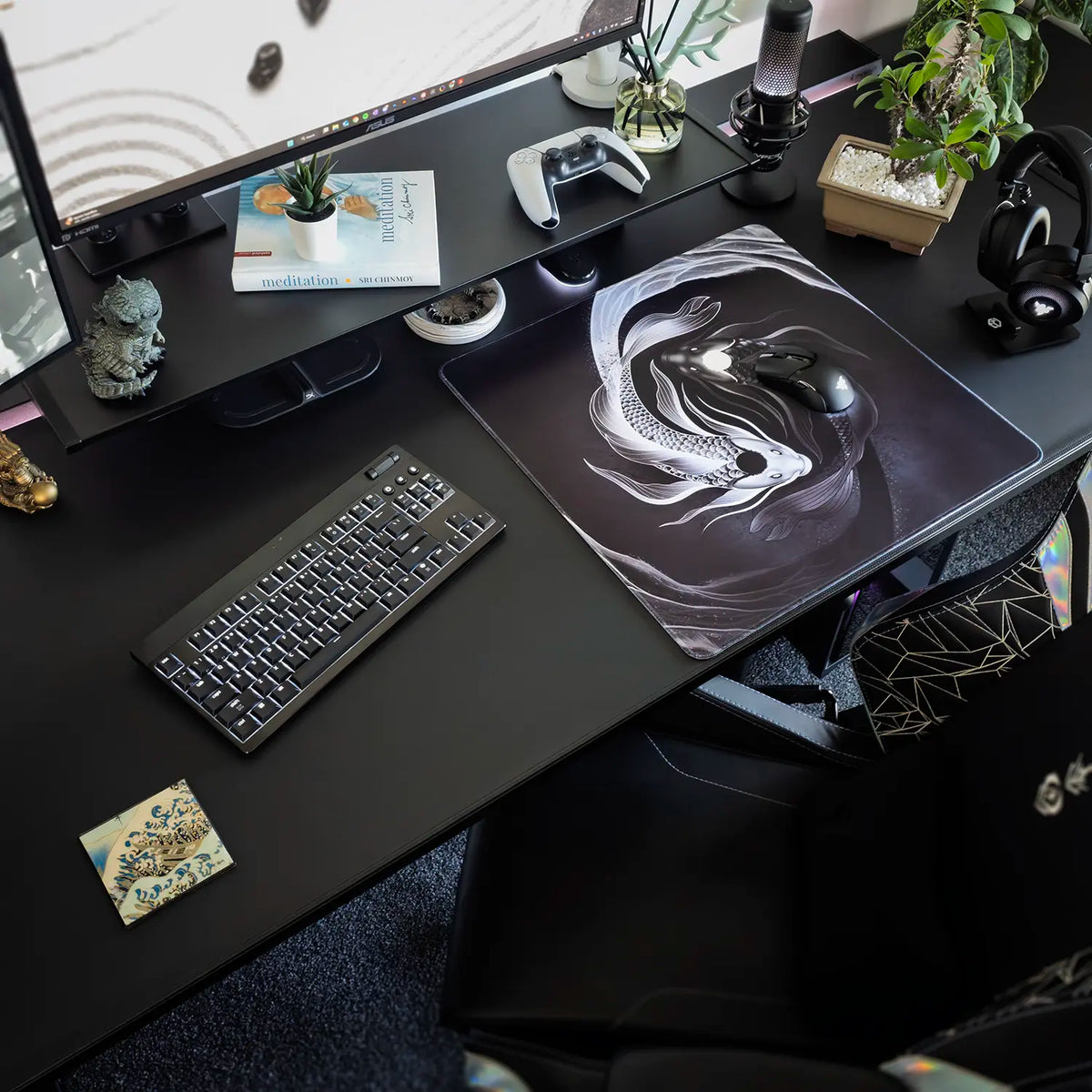 Decorative medium ArcaLoot gaming mousepad on a desk with black and white Koifish design. Eternal Harmony.