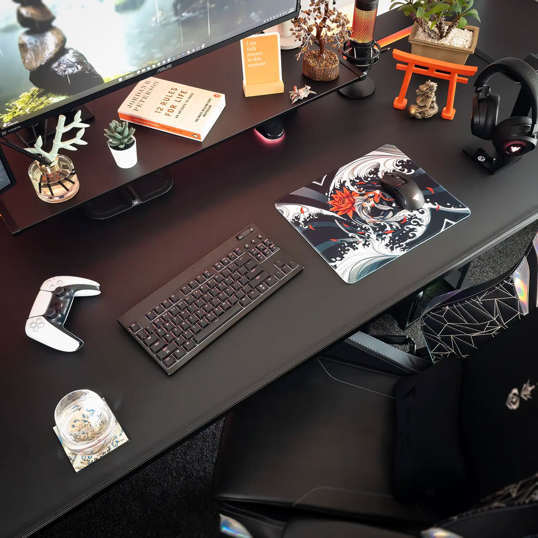 Decorative desk setup with a small Arcaloot gaming mousepad featuring a koifish design. Rippled Tranquillity. 