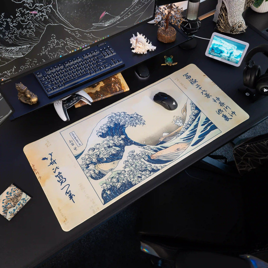 Large Arcaloot gaming mousepad featuring a fishy twist on the famous Kanagawa Wave on a black gaming.  setup. Kanagawa Fish Wave. Used by MrSavage