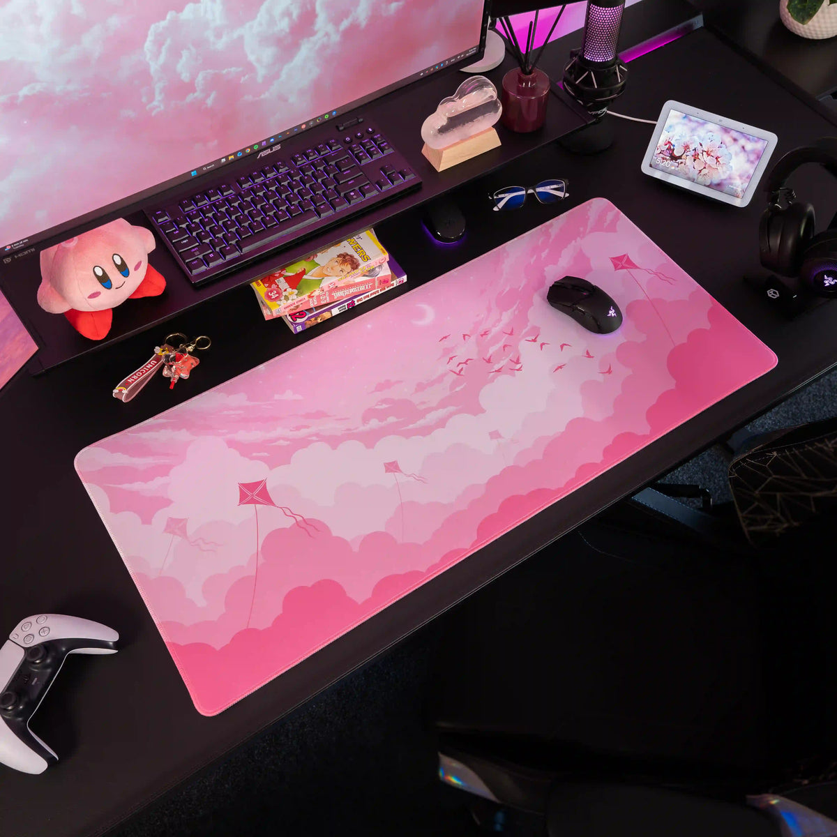 Large ArcaLoot gaming mousepad with pink sky and clouds design on a black gaming setup. Pink Dreams.