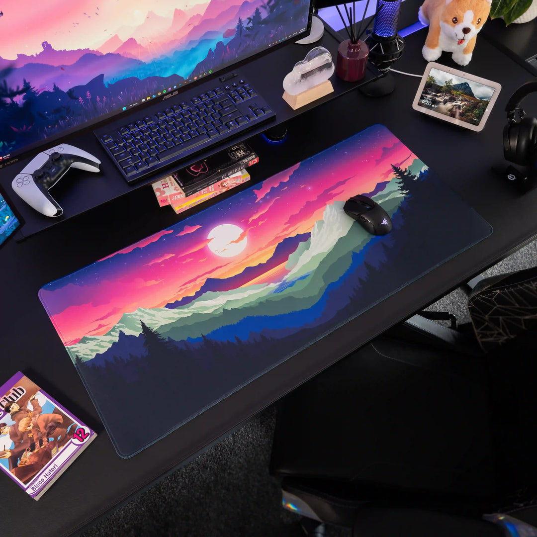 Large ArcaLoot gaming mousepad with a mountain and sunset rainbow design on a black gaming setup. Rainbow Valley. 