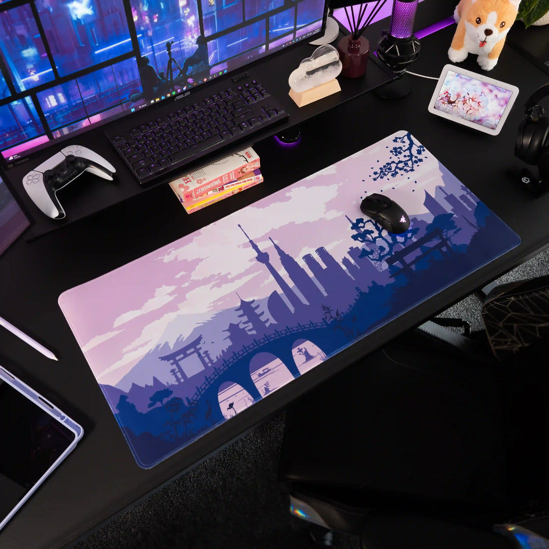 Large ArcaLoot Gaming mousepad with a Japanese-themed design featuring a purple and white design on a black gaming setup. Sakura Cityscape.