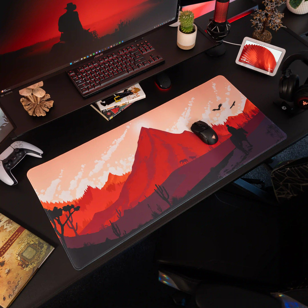 Large ArcaLoot Gaming Mousepad featuring a western desert landscape design on a black gaming setup. Sunset Wrangler.
