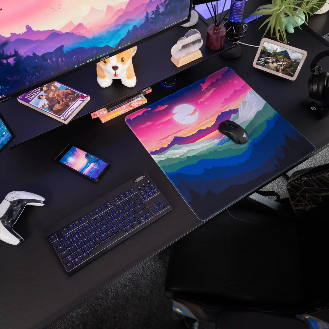 Medium ArcaLoot gaming mousepad with a mountain and sunset rainbow design on a black gaming setup. Rainbow Valley. 
