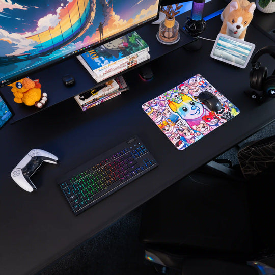 Small ArcaLoot gaming mousepad featuring colorful cartoon dog characters from AussieAntics on a black gaming setup. AussieAntics Steve Emotes.