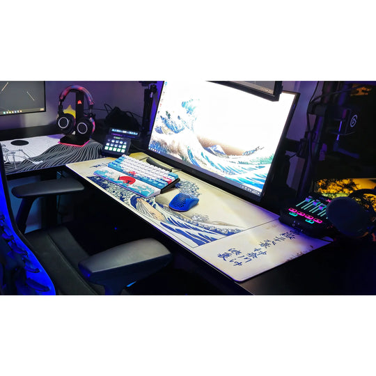 Large Arcaloot gaming mousepad featuring a fishy twist on the famous Kanagawa Wave on a black gaming setup. Kanagawa Fish Wave.