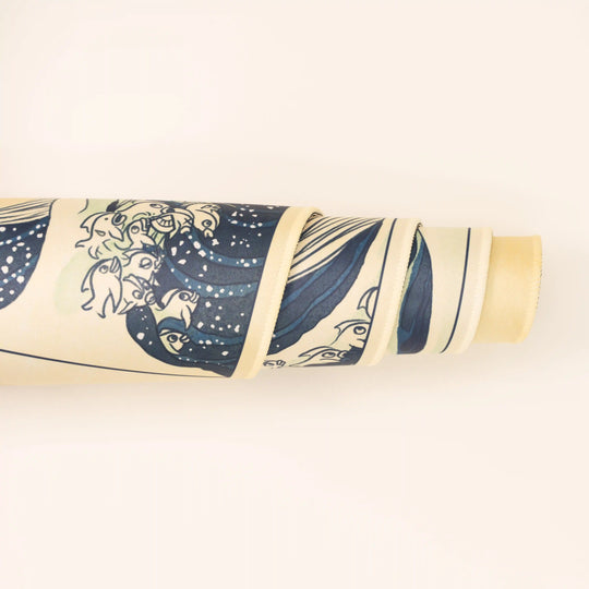 ArcaLoot Gaming Mousepad curled to show premium stitched edges - Kanagawa Fish Wave