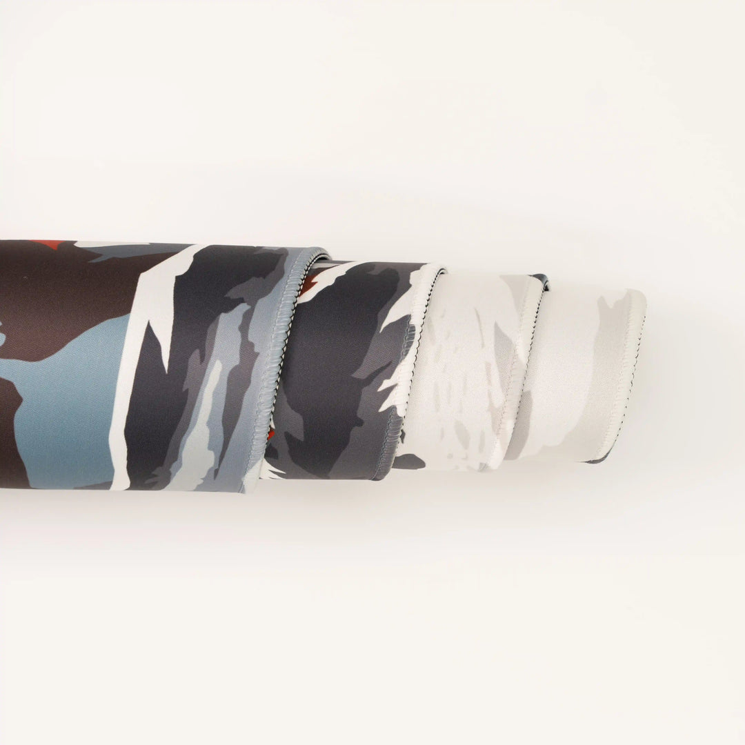 ArcaLoot Gaming Mousepad curled to show premium stitched edges - Blade and Flame