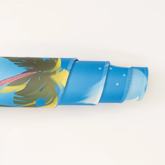 ArcaLoot Gaming Mousepad curled to show premium stitched edges - Treasure Cove