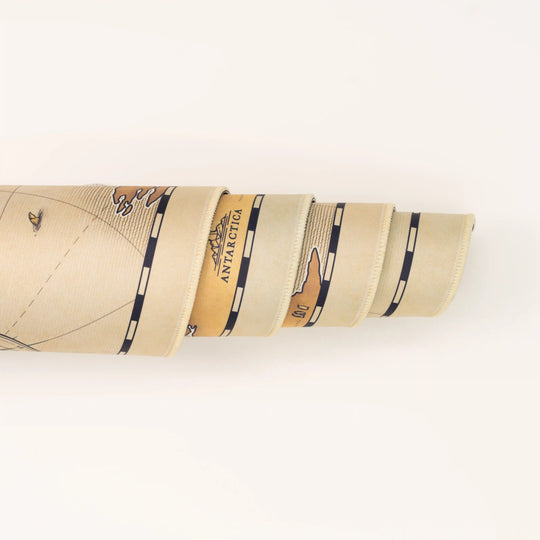 ArcaLoot Gaming Mousepad curled to show premium stitched edges - Unchartered Earth - World Map