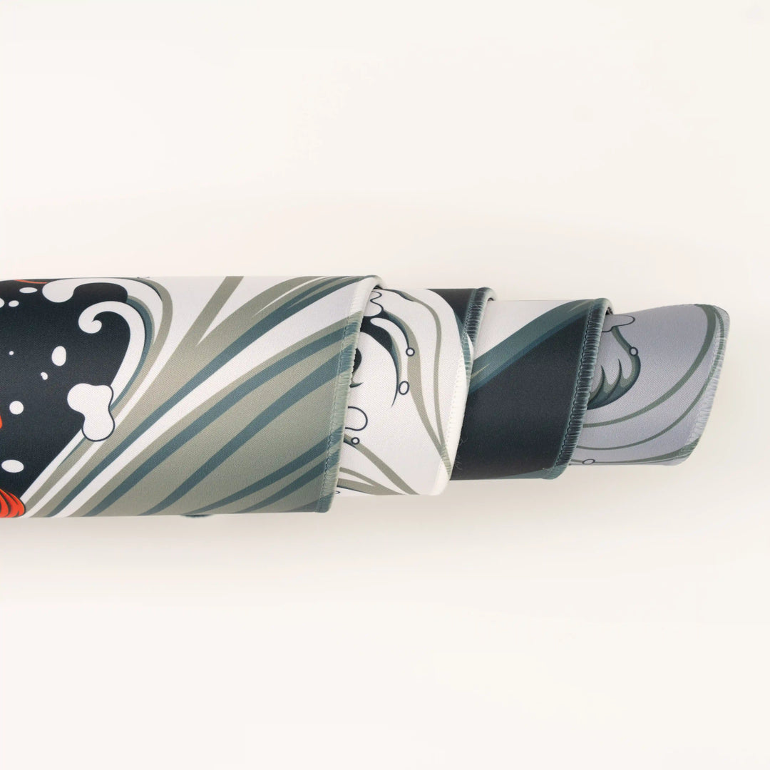 ArcaLoot Gaming Mousepad curled to show premium stitched edges - Rippled Tranquility