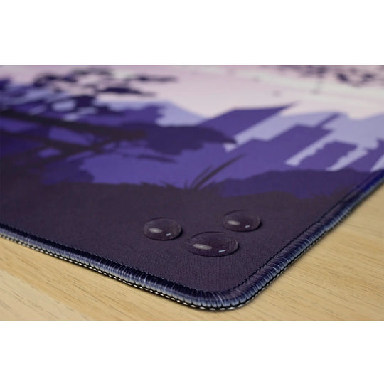 Clear water droplets on a purple gaming mousepad. Sakura Cityscape.