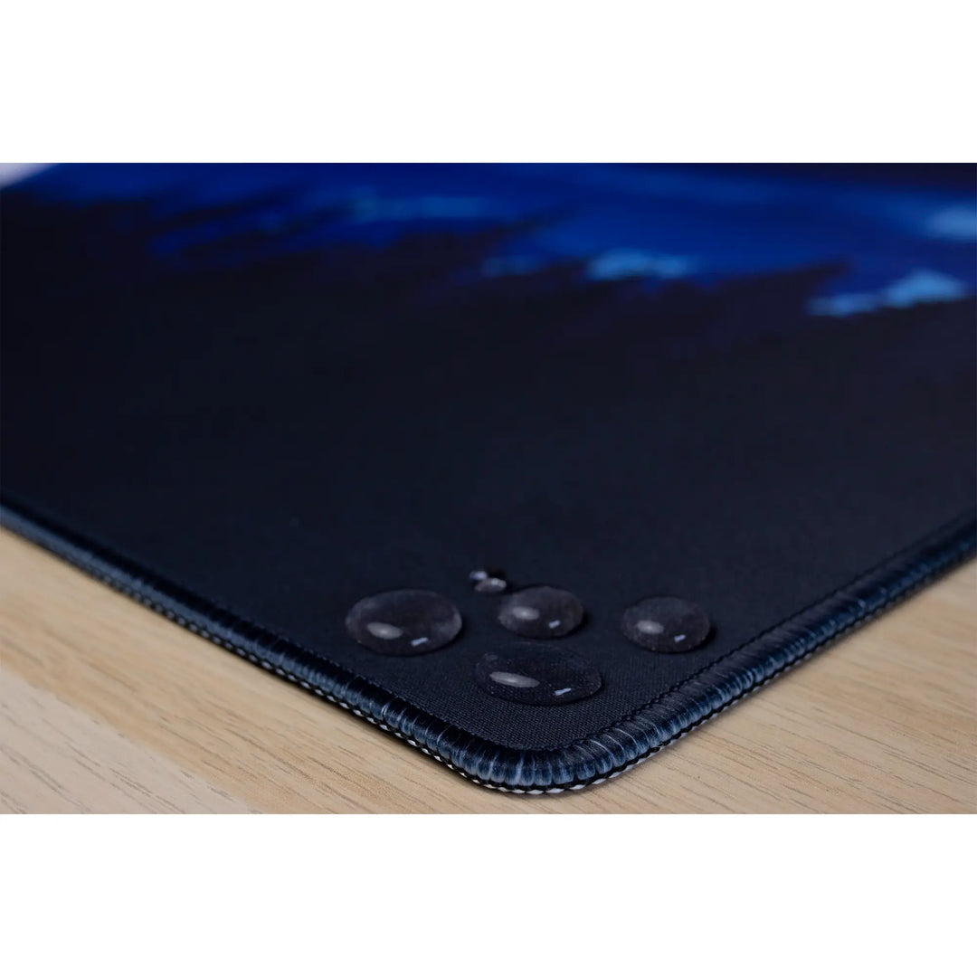 Clear water droplets on an AussieAntics gaming mousepad. AussieAntics Alpine Aurora. 