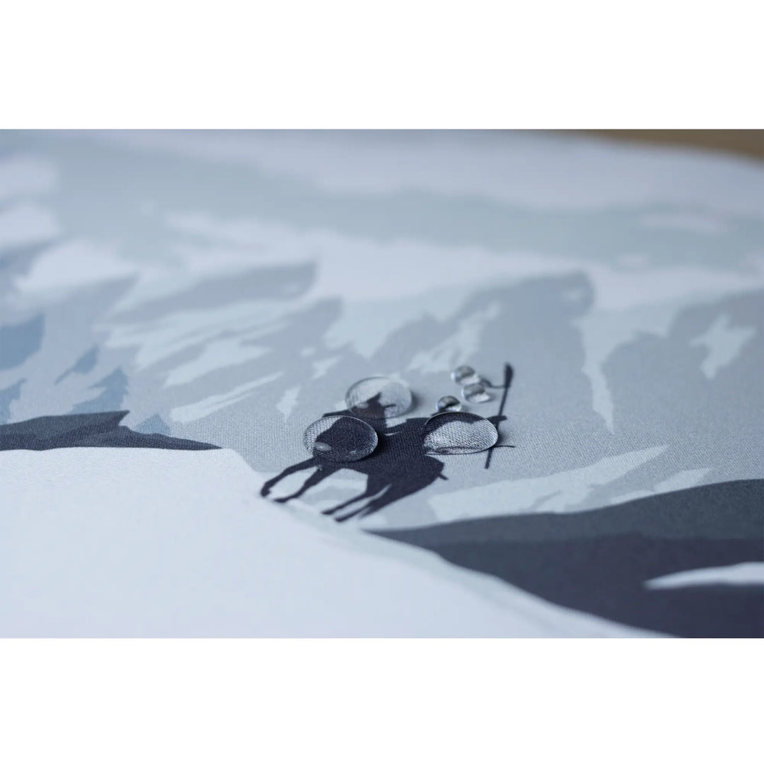 Clear water droplets on an ArcaLoot gaming mousepad featuring a knight. Blade and Flame.
