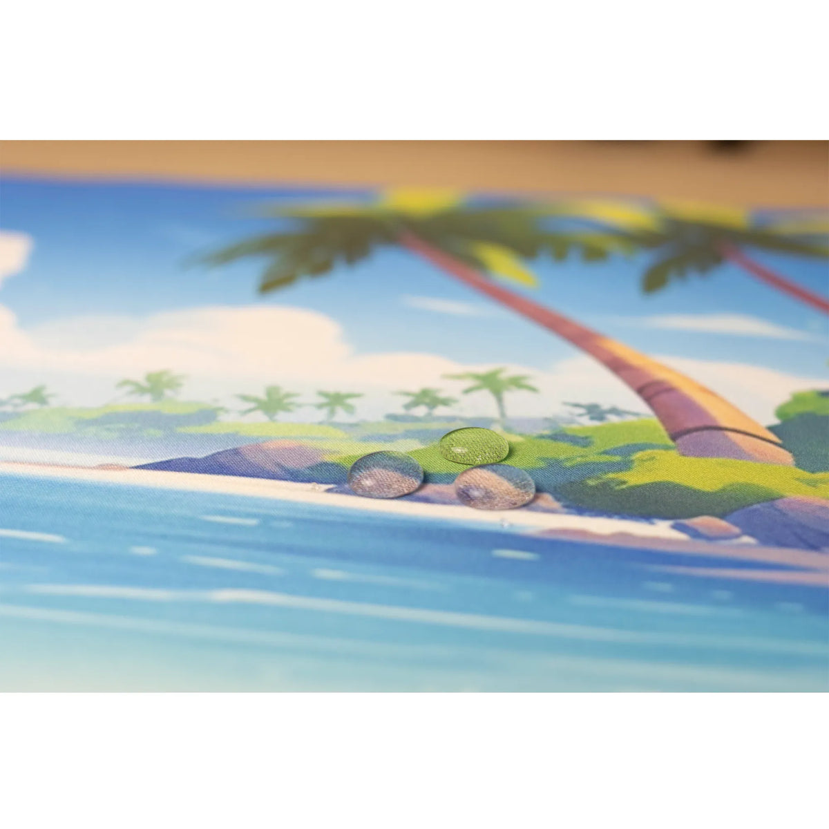 Clear water droplets on a beach themed ArcaLoot mousepad. Treasure Cove.