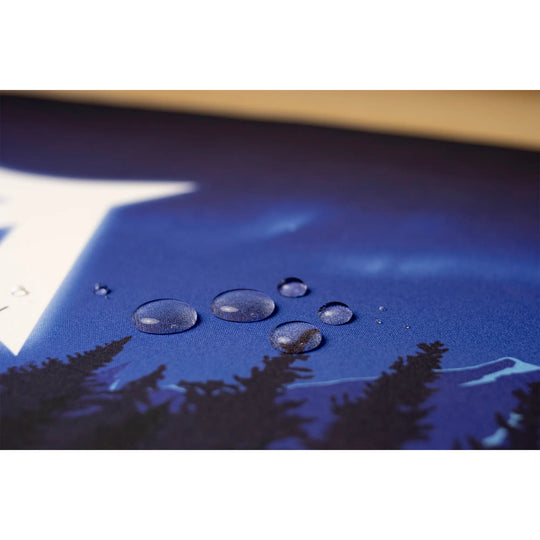 Clear water droplets on an AussieAntics gaming mousepad. AussieAntics Alpine Aurora. 